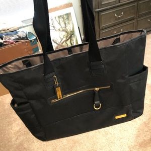 Skip hop diaper bag with changing pad